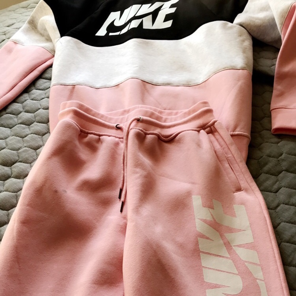 Pink and white mens nike suit